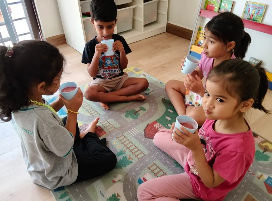 Teacher reading a story to children