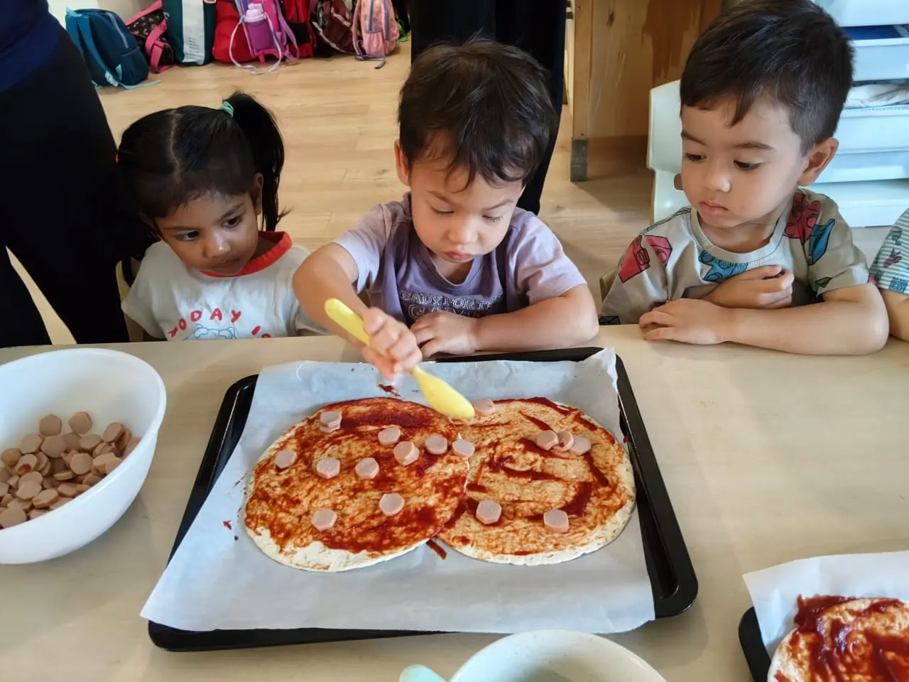 Children playing together in the Montessori classroom