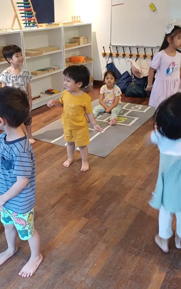 Toddlers playing outdoors