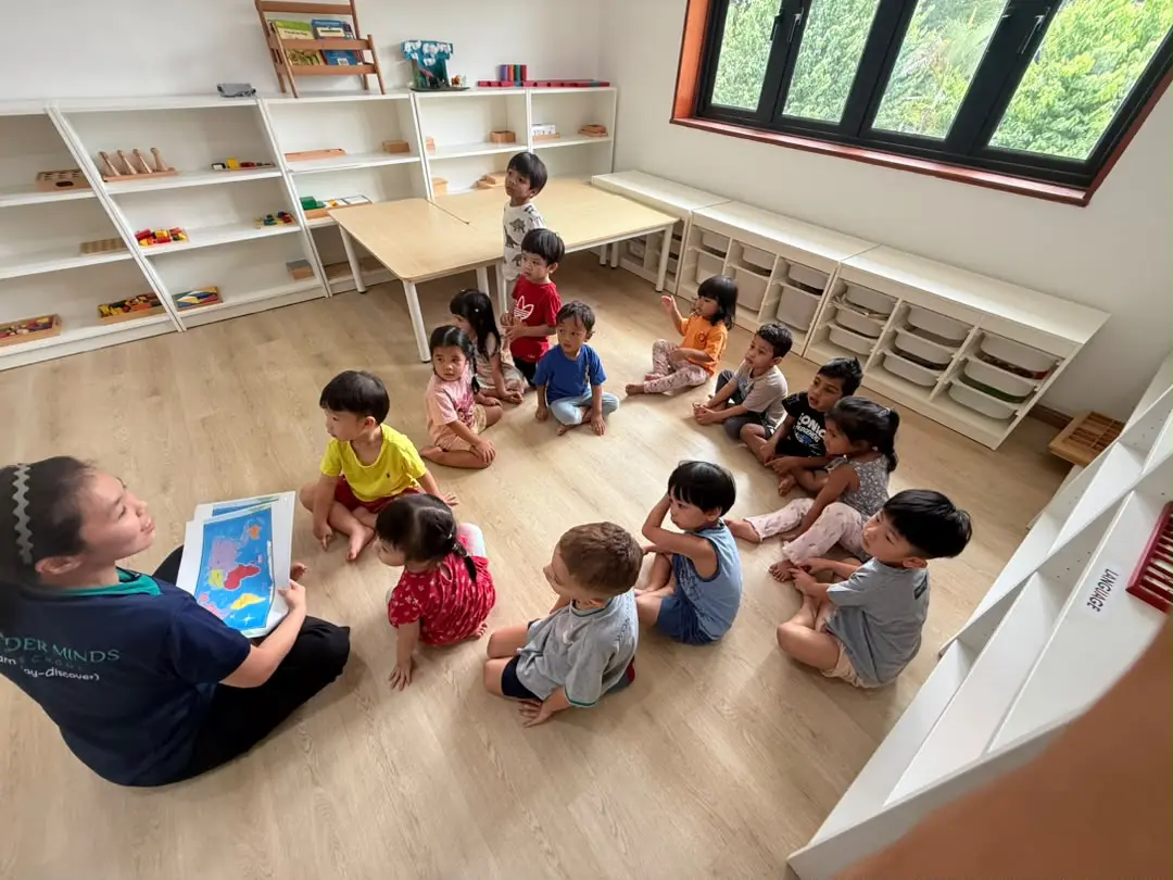 Toddler exploring sensory play materials