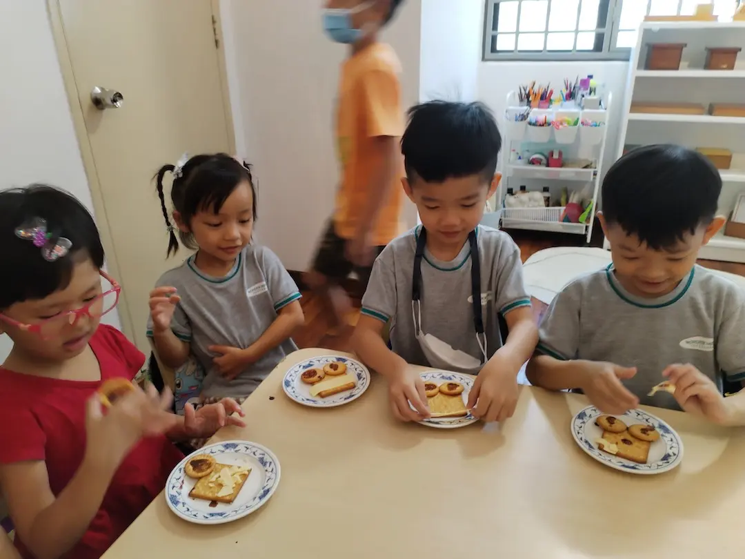 Children at a table with decorated toast