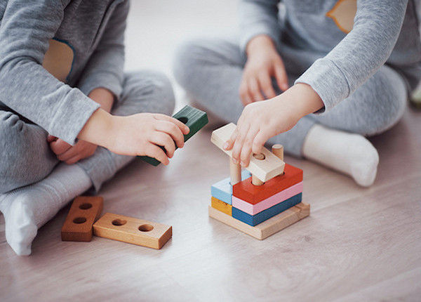 kids playing with wooden blocks