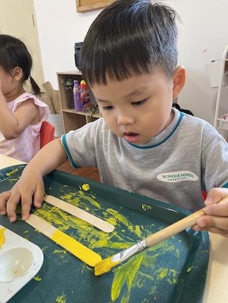 group of kids playing on a table