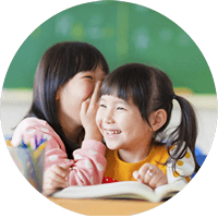 two happy girls in class